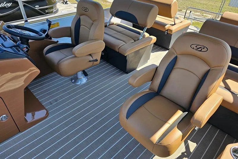 Slide: The Image of Luxurious seating on 2026 Bentley Pontoons Legacy 223 QSB with tan and black upholstery. - 16