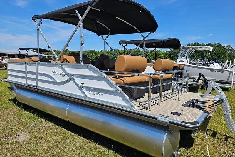 Slide: The Image of 2026 Bentley Pontoons Legacy 223 QSB pontoon boat with canopy and seating on display. - 8