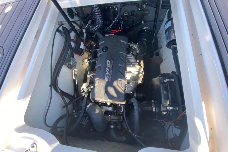 Slide: The Image of Engine compartment of 2023 Yamaha Boats 195 FSH Sport, showcasing SVHO engine details. - 11
