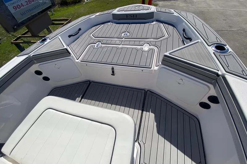 Slide: The Image of 2023 Yamaha Boats 195 FSH Sport interior with sleek, modern design and ample storage. - 3