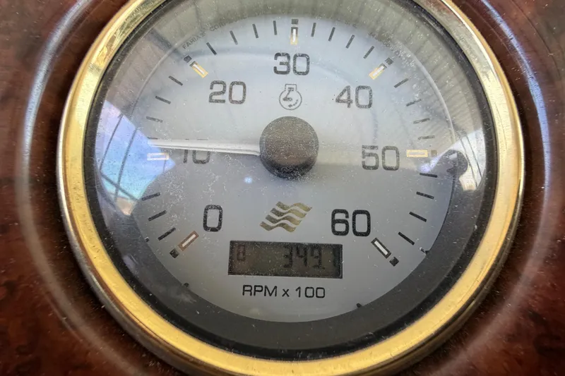 Slide: The Image of Close-up of a 2004 Four Winns 280 Horizon boat tachometer displaying RPM. - 14