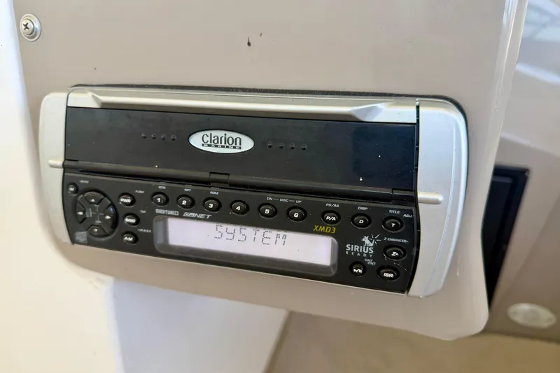 Slide: The Image of Clarion Marine stereo system in a 2004 Four Winns 280 Horizon boat. - 17