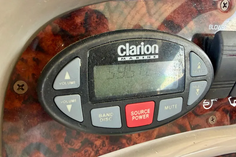 Slide: The Image of Clarion Marine audio system on 2004 Four Winns 280 Horizon boat dashboard. - 18