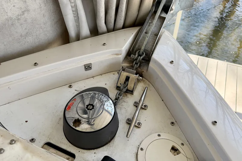 Slide: The Image of 2004 Four Winns 280 Horizon boat anchor winch and chain mechanism. - 21