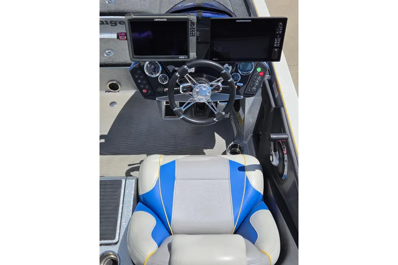 Slide: The Image of 2017 Ranger Z521 Comanche boat cockpit with dual displays and steering wheel. - 7