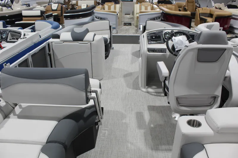 Slide: The Image of Interior view of 2026 Avalon 2385 25 LSZ QLS pontoon boat with modern seating and helm. - 7