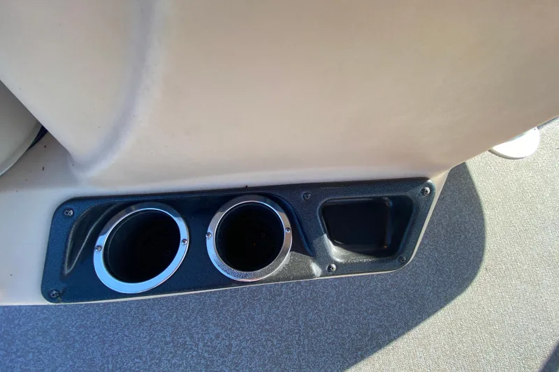 Slide: The Image of Cup holders on 2018 Sun Tracker Bass Buggy 18 DLX boat interior. - 10