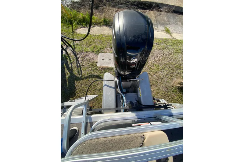 Slide: The Image of 2018 Sun Tracker Bass Buggy 18 DLX boat engine view from above. - 13
