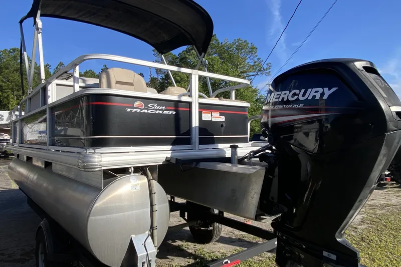 Slide: The Image of 2018 Sun Tracker Bass Buggy 18 DLX pontoon boat with Mercury outboard motor. - 3