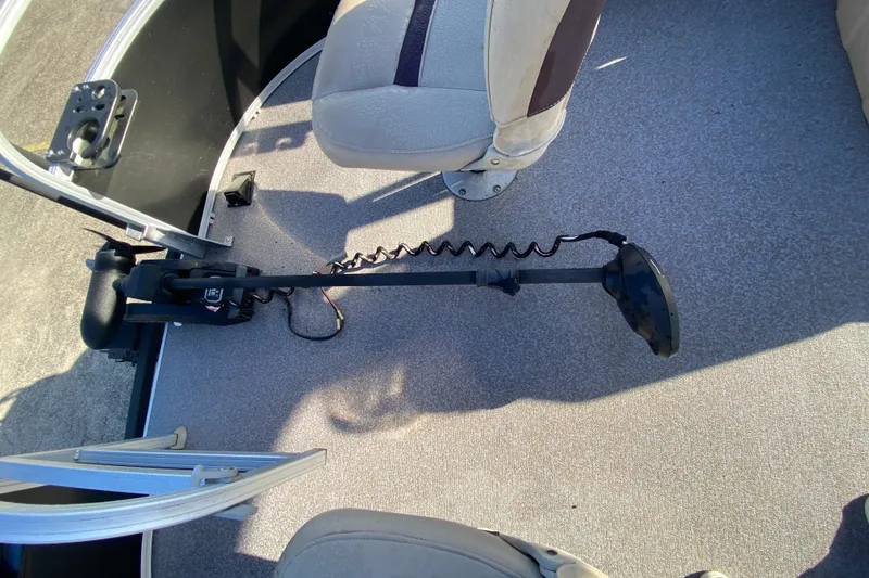 Slide: The Image of 2018 Sun Tracker Bass Buggy 18 DLX interior with trolling motor and seating. - 8