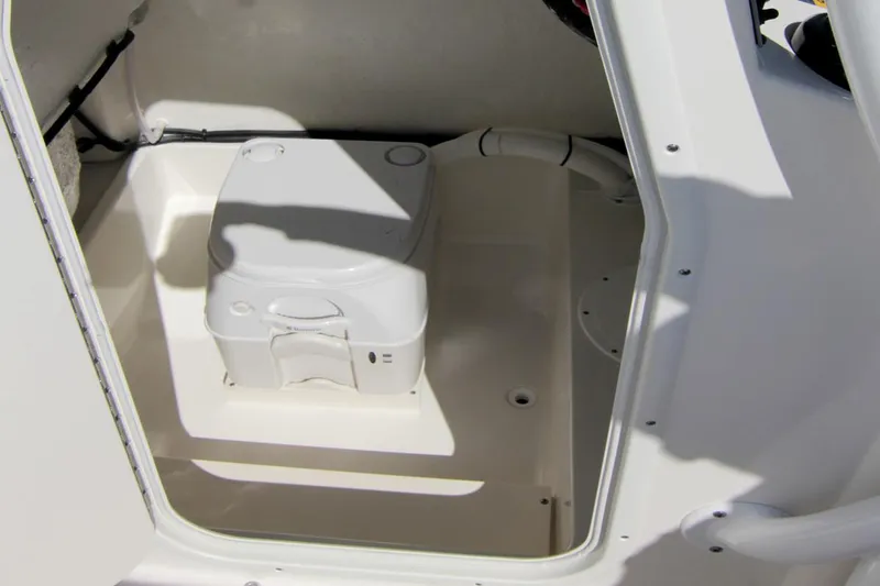 Slide: The Image of Manufacturer Provided Image: Interior of 2026 Sea Born LX22 Center Console with toilet. - 12