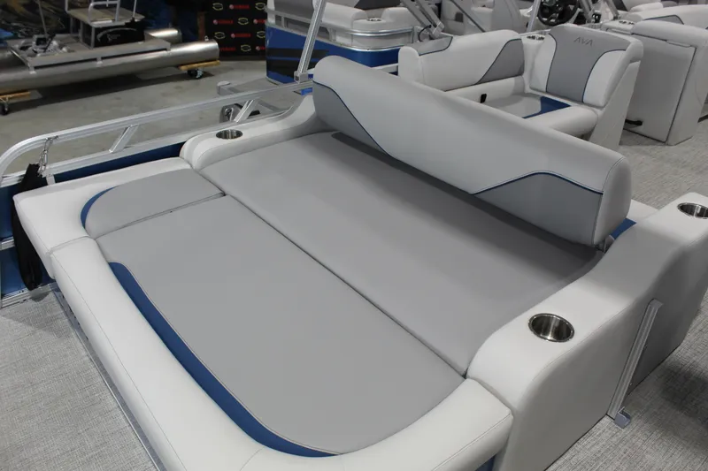 Slide: The Image of Luxurious seating on 2026 Avalon 2385 25 Venture 85 VRB pontoon boat, featuring cup holders. - 7