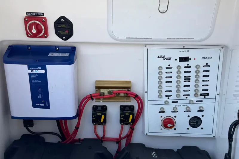 Slide: The Image of Electrical panel and components on a 2019 Sea Vee 270Z boat. - 22