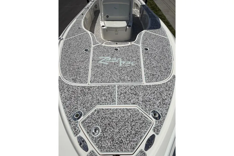 Slide: The Image of 2019 Sea Vee 270Z boat deck with custom non-slip surface and storage compartments. - 24