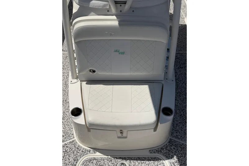 Slide: The Image of 2019 Sea Vee 270Z boat seating area with cup holders and diamond-pattern upholstery. - 30
