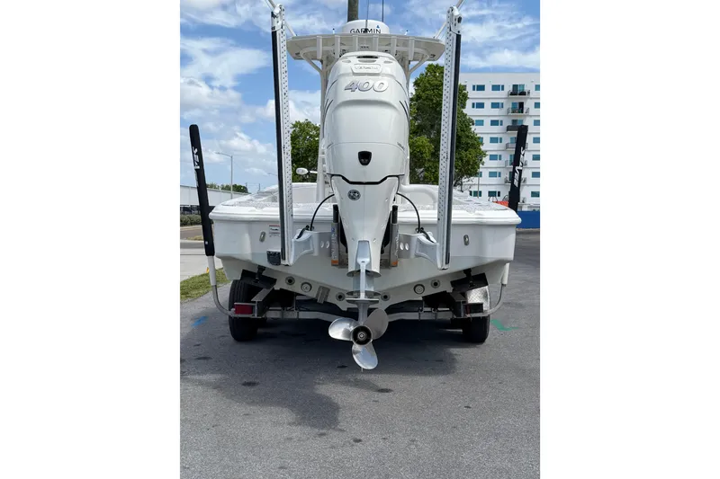Slide: The Image of 2019 Sea Vee 270Z boat with powerful outboard motor, parked on a trailer. - 6
