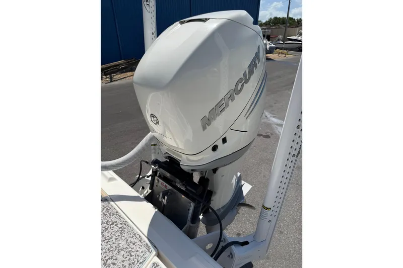 Slide: The Image of 2019 Sea Vee 270Z boat with Mercury outboard motor in a marina setting. - 8