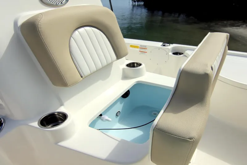 Slide: The Image of Manufacturer Provided Image: 2025 Sea Born FX21 Bay boat seating with integrated storage and cup holders. - 5