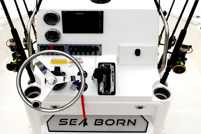 Slide: The Image of Manufacturer Provided Image: 2025 Sea Born FX22 Bay boat console with steering wheel and controls. - 7