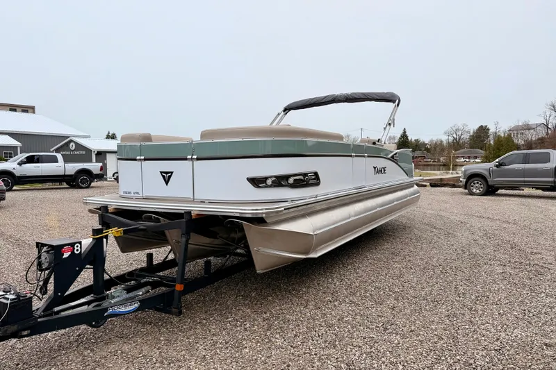 Slide: The Image of 2026 Tahoe Pontoon Cascade 25' VRL on trailer in outdoor setting. - 6