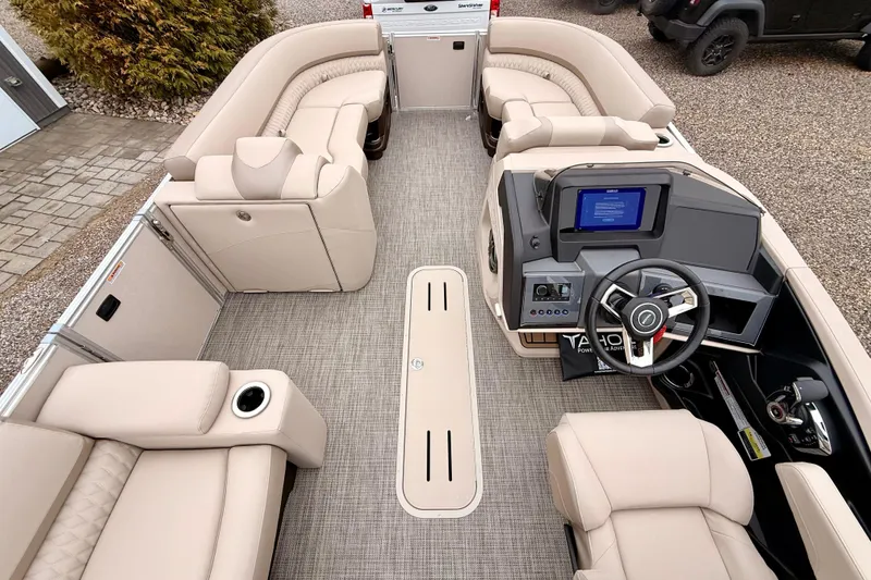 Slide: The Image of Luxurious interior of 2026 Tahoe Pontoon Cascade 25' VRL with plush seating and modern dashboard. - 8