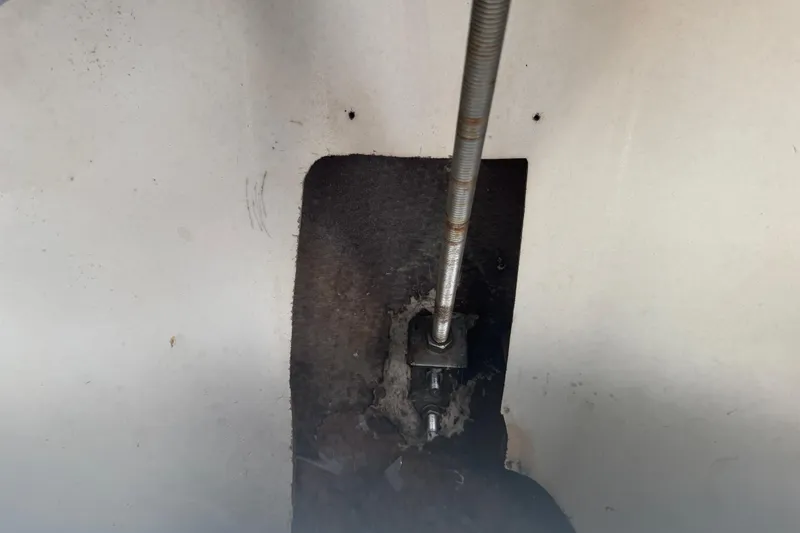 Slide: The Image of Close-up of a 1990 Mako 241 Center Console boat's interior component. - 20