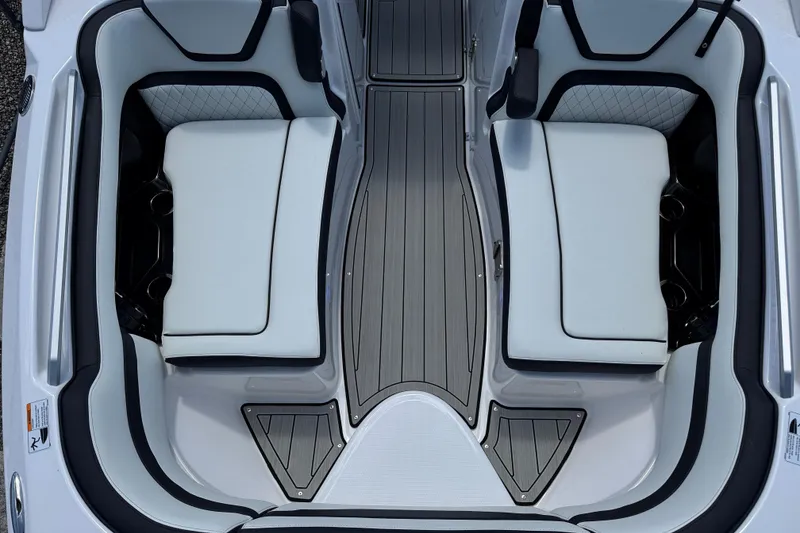 Slide: The Image of 2026 Yamaha Boats 275SD interior with sleek seating and modern design. - 28