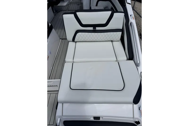 Slide: The Image of 2026 Yamaha Boats 275SD, luxurious white seating with black accents. - 5