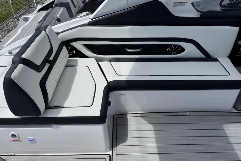 Slide: The Image of 2026 Yamaha Boats 275SD interior seating with sleek, modern design and premium upholstery. - 9