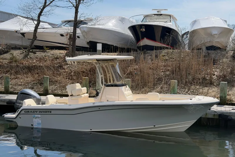The Image of 2026 Grady-White Fisherman 216 boat docked near other vessels. - 0