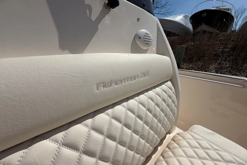 Slide: The Image of 2026 Grady-White Fisherman 216 boat seat with embossed logo and quilted design. - 19
