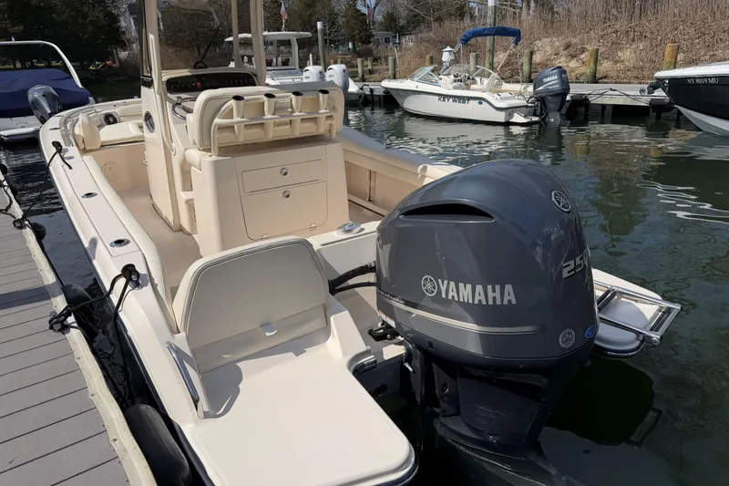 Slide: The Image of 2026 Grady-White Fisherman 216 boat with Yamaha 250 engine docked at marina. - 4