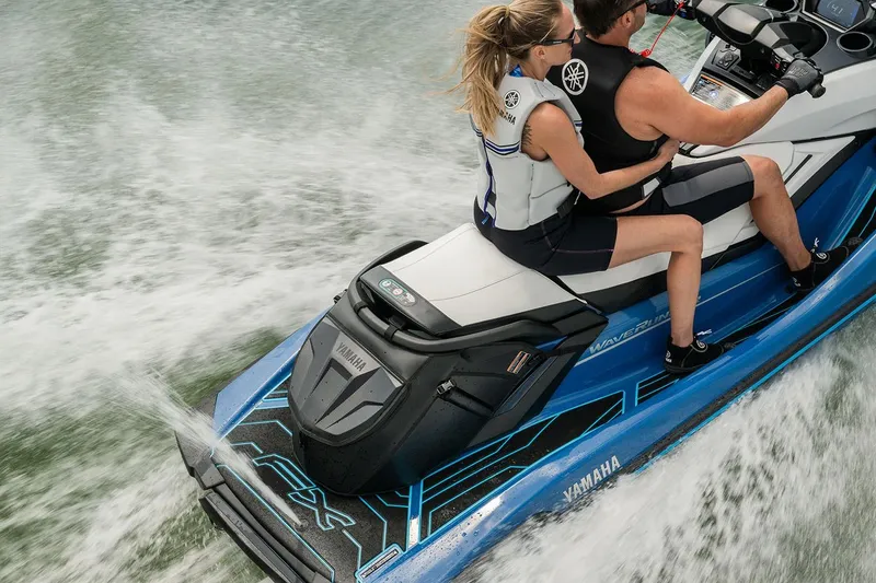 Slide: The Image of Manufacturer Provided Image: 2026 Yamaha WaveRunner FX HO jet ski with two riders on water. - 9