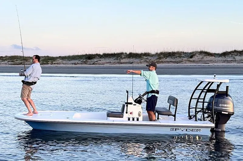 Slide: The Image of Manufacturer Provided Image: Two people fishing on a 2025 Spyder FX17 Flicker boat in calm waters. - 2
