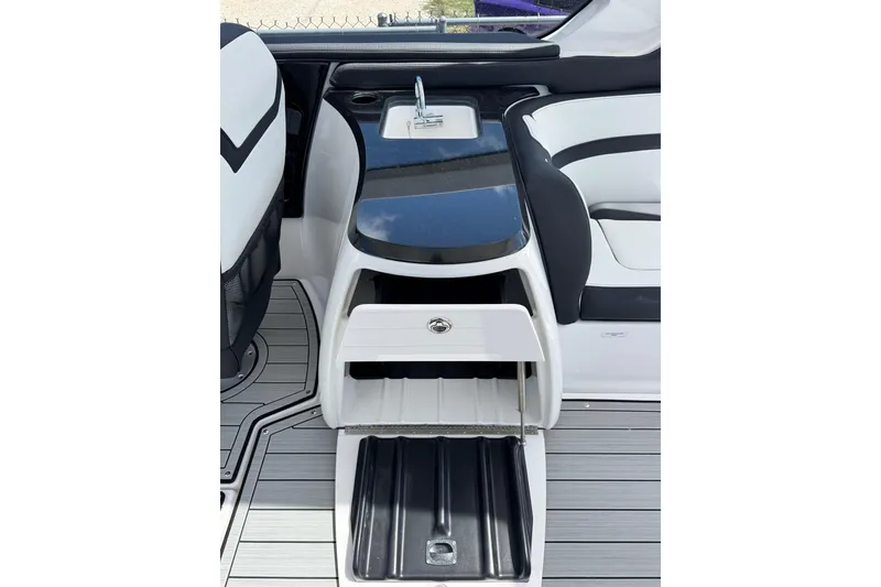 Slide: The Image of 2026 Yamaha Boats 275SD interior with sleek sink and storage compartments. - 13