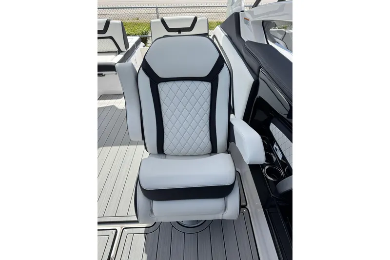 Slide: The Image of Luxurious seating on the 2026 Yamaha Boats 275SD, featuring elegant diamond stitching and modern design. - 15