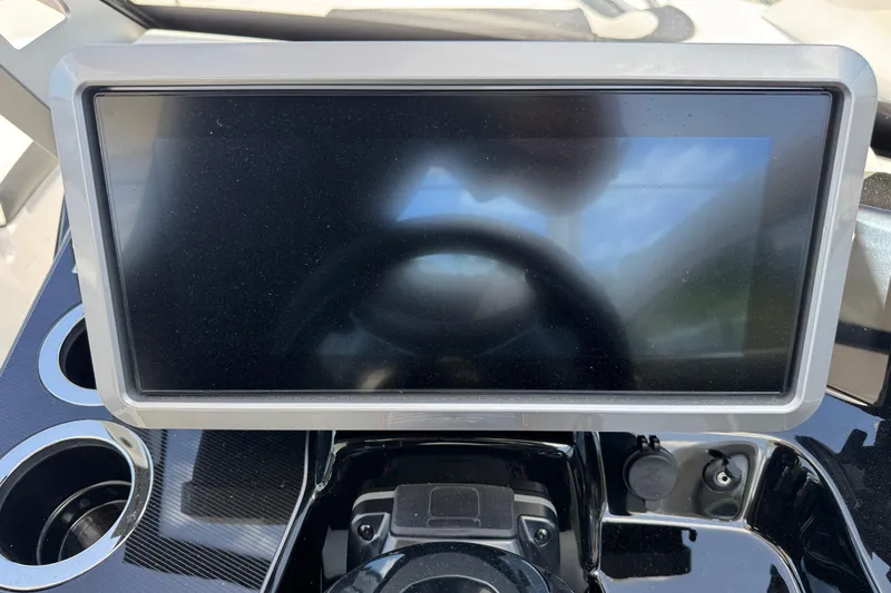 Slide: The Image of Dashboard of 2026 Yamaha Boats 275SD featuring a sleek touchscreen display. - 24