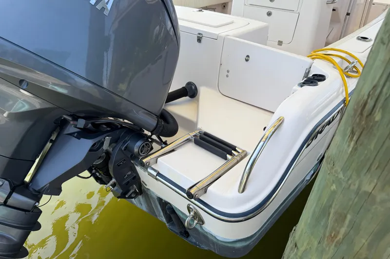 Slide: The Image of 2004 Grady-White Advance 257 boat with Yamaha outboard motor at dock. - 11