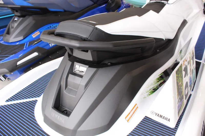 Slide: The Image of 2026 Yamaha WaveRunner VX Deluxe, sleek design, white and black seat, close-up view. - 6