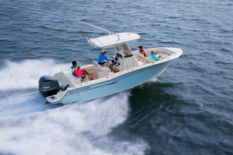 The Image of 2026 Grady-White Fisherman 236 boat cruising on open water with passengers. - 0