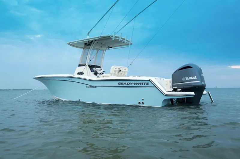 Slide: The Image of 2026 Grady-White Fisherman 236 boat on water with Yamaha engine. - 3