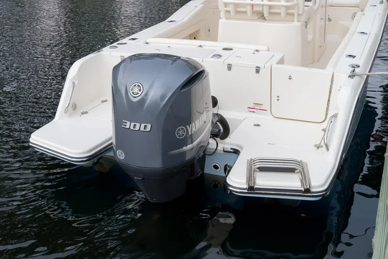 Slide: The Image of 2026 Grady-White Fisherman 236 boat with Yamaha 300 outboard motor on water. - 4
