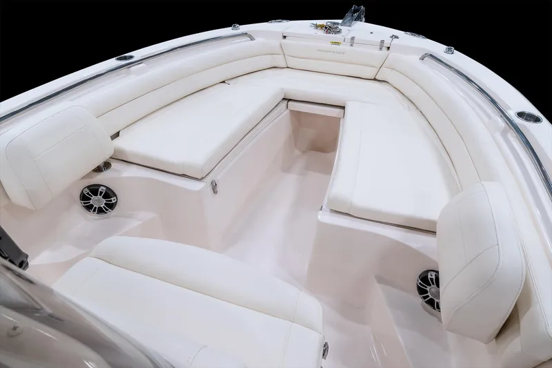 Slide: The Image of 2026 Grady-White Fisherman 236 boat interior with white cushioned seating. - 9