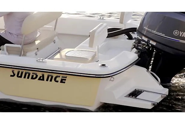 Slide: The Image of Manufacturer Provided Image: Sundance B20CCR 2025 boat with Yamaha outboard motor on water. - 9