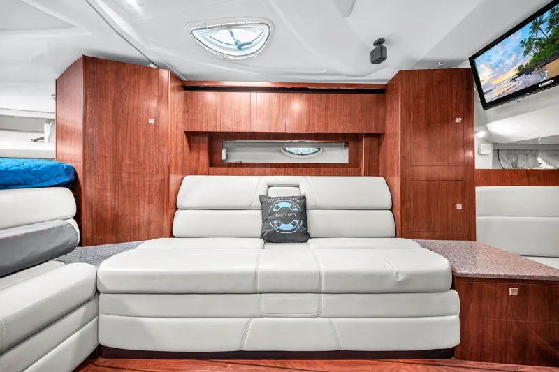 Slide: The Image of Luxurious interior of 2014 Monterey 320 Sport Yacht with plush seating and modern amenities. - 33