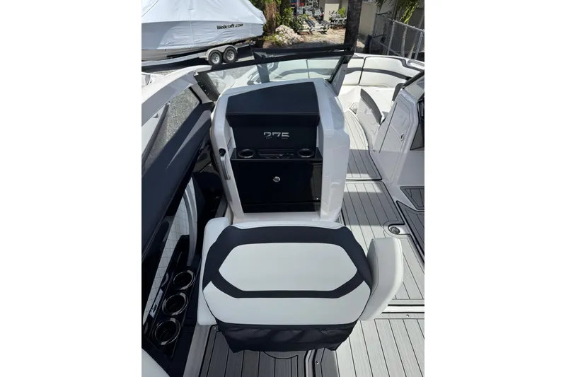 Slide: The Image of 2026 Yamaha Boats 275SD interior with sleek seating and modern dashboard design. - 14