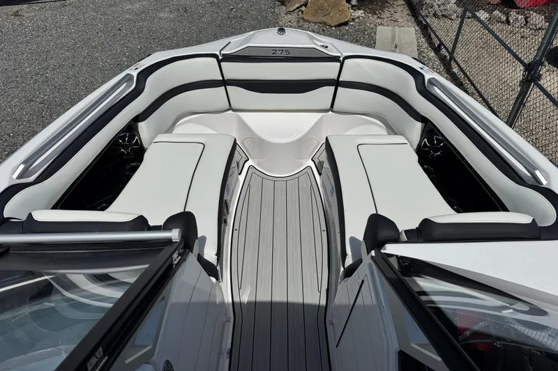 Slide: The Image of 2026 Yamaha Boats 275SD interior with sleek seating and modern design. - 25