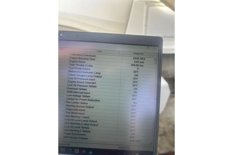 Slide: The Image of Laptop screen displaying diagnostic data for a 2000 Cobalt 226 engine. - 12
