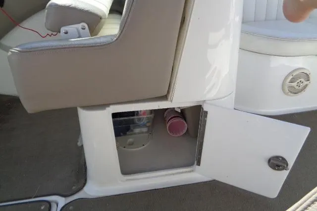 Slide: The Image of Open storage compartment in 2006 Cobalt 282 boat interior. - 22