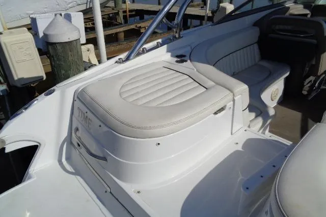 Slide: The Image of 2006 Cobalt 282 boat interior with white leather seating and sleek design. - 31
